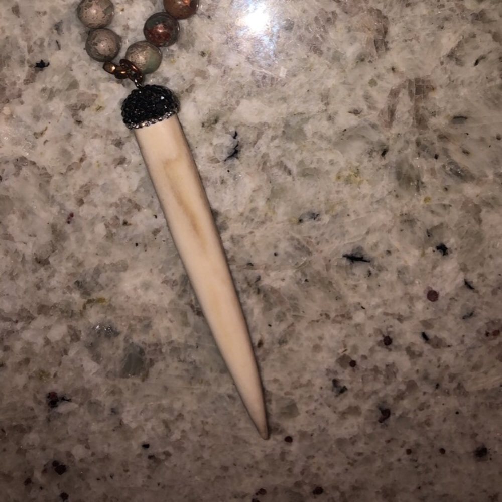 Boutique saber tooth necklace